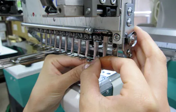 Pa++ern esoteric language for embroidery